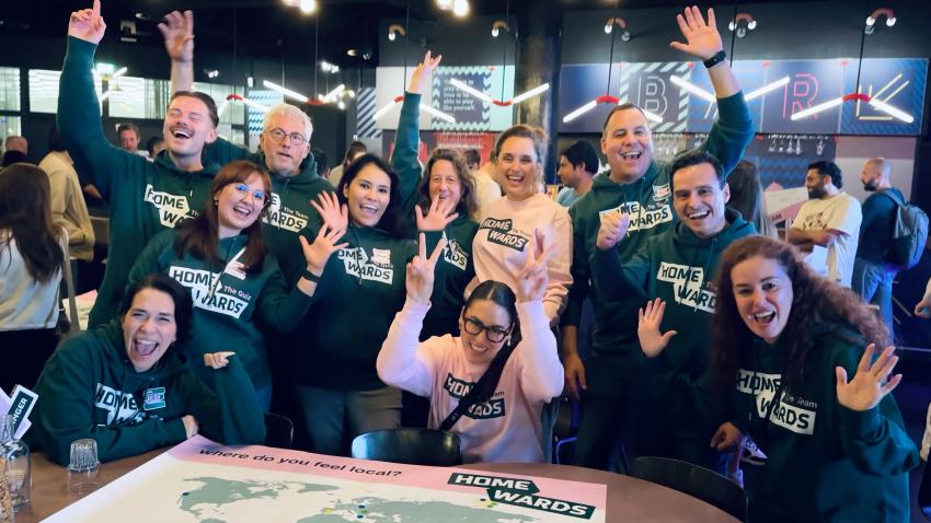 Organizers of Homewards smiling and waving