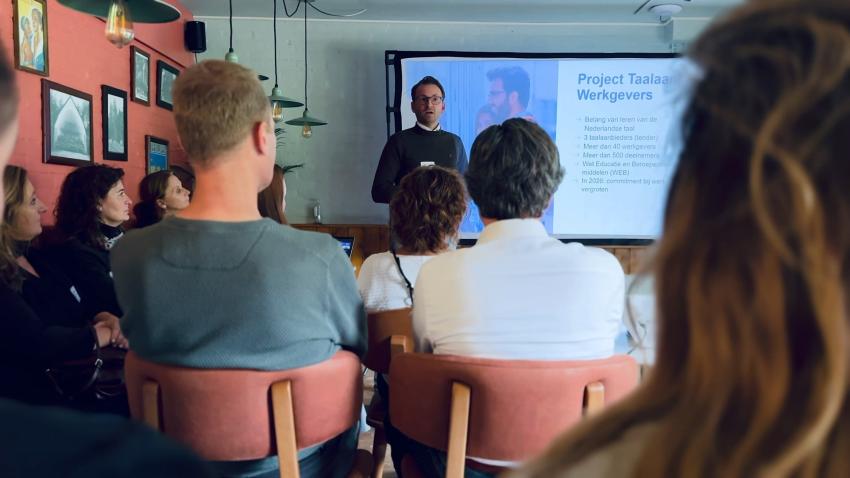 Kris presenting to partners