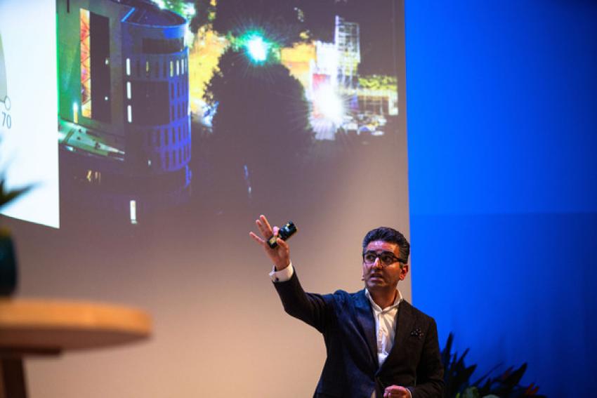 A presenter engaged with the audience