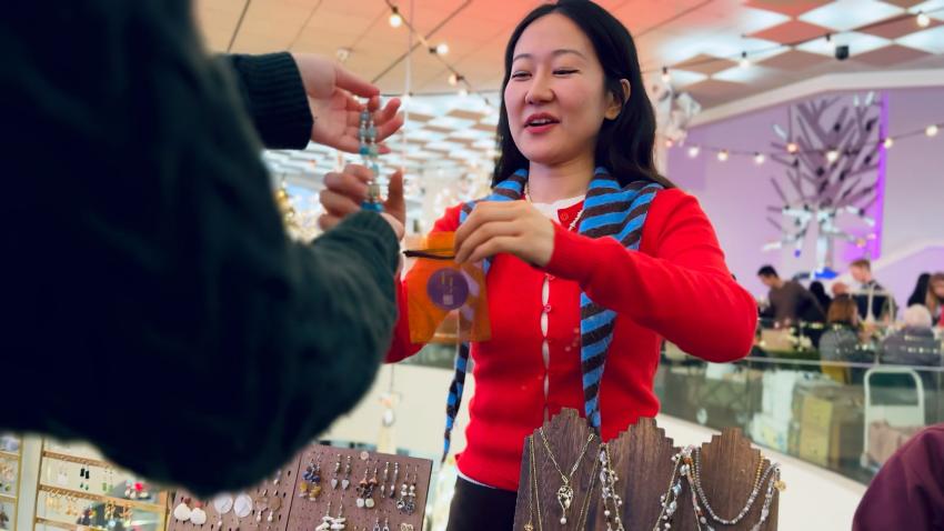 Woman selling jewellery