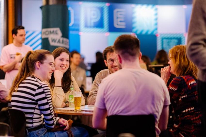 Smiling participants at Homewards evening