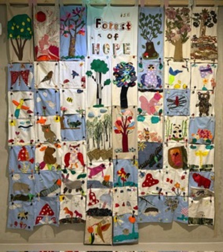 Wall forest of textile trees and animals