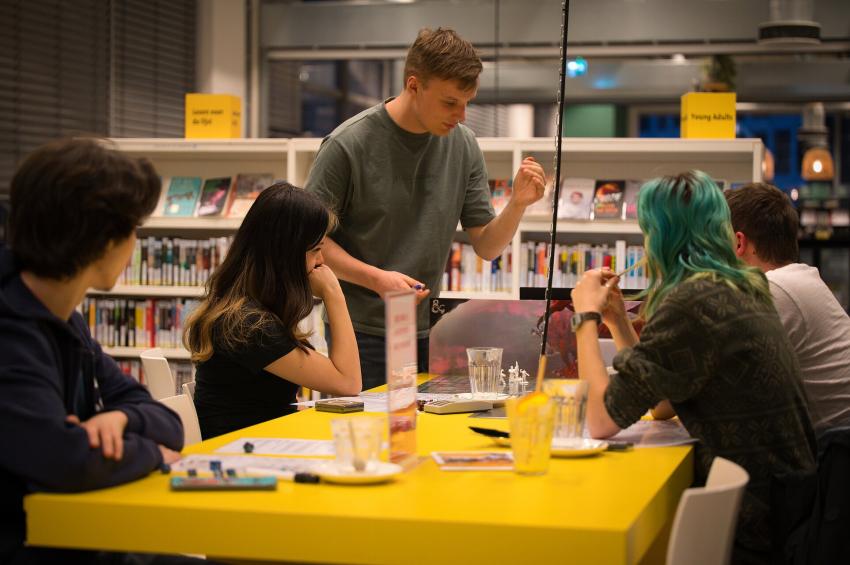 Five people playing a game