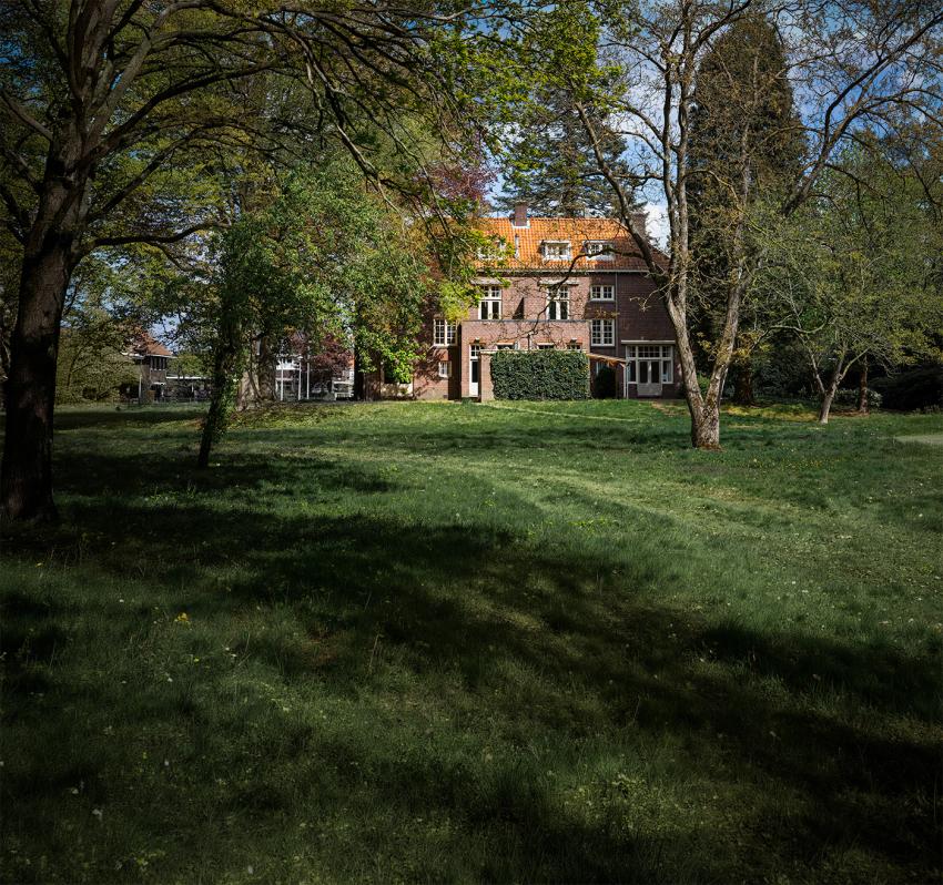 A photo of Seeker Education's building surrounded by trees