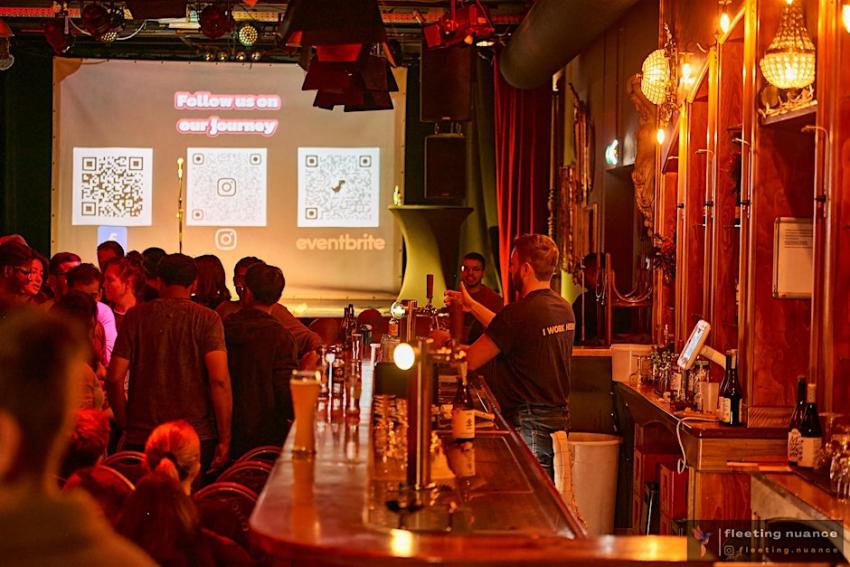 People chatting in a bar