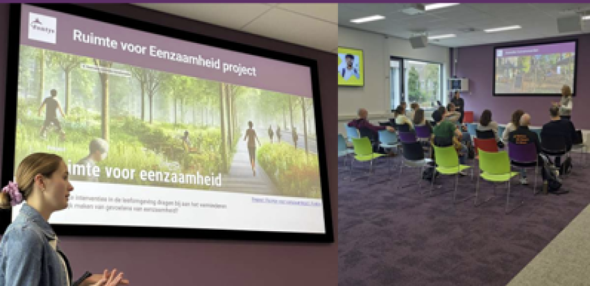 Screen and audience at the presentation