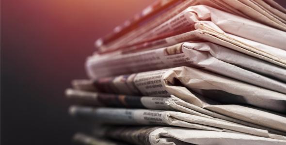 Photo of a stack of newspapers