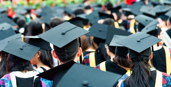 Photo of graduates with mortarboards
