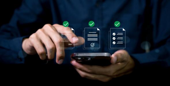 Photo of a mobile phone with image of apps with check boxes