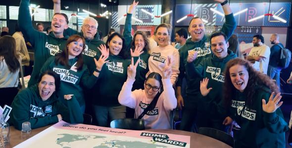 Organizers of Homewards smiling and waving