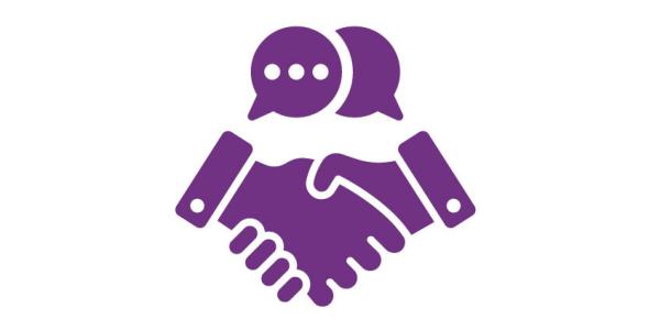 A handshake with two speech bubbles