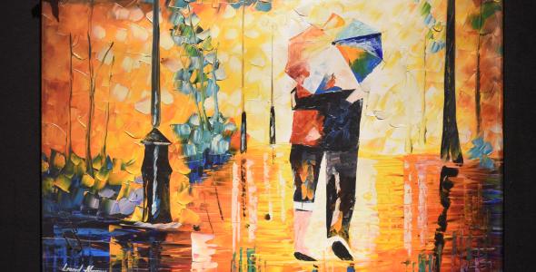 Lego Brick Exhibition image of 2 people walking under an umbrella