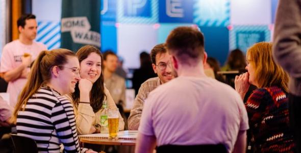 Smiling participants at Homewards evening