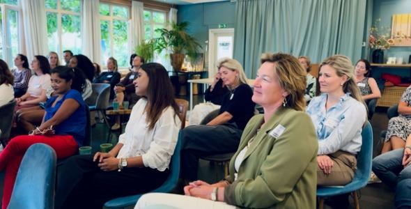 An audience of women