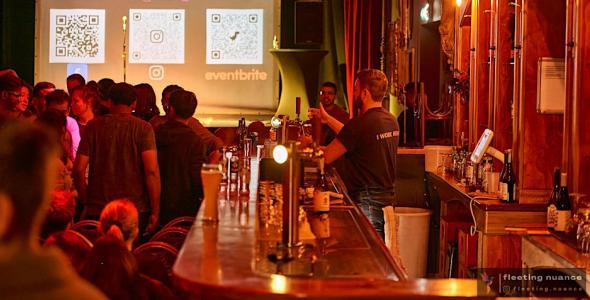 People chatting in a bar